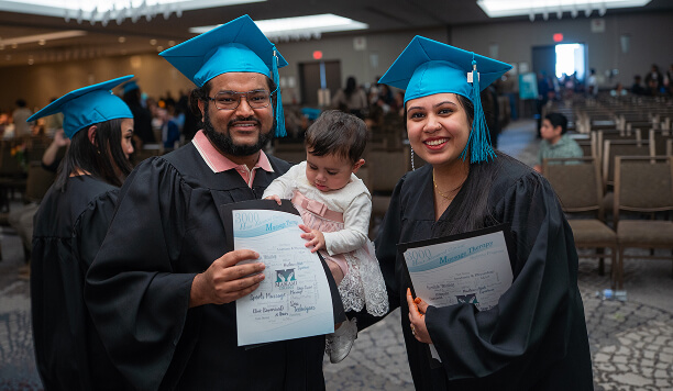 MaKami College graduates with a child